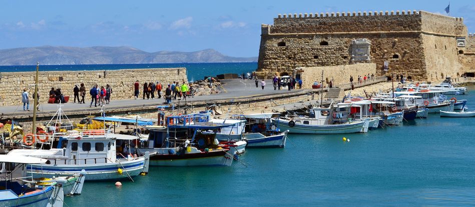 Port of Heraklion in Crete, Fortress and fishing boats, Greece