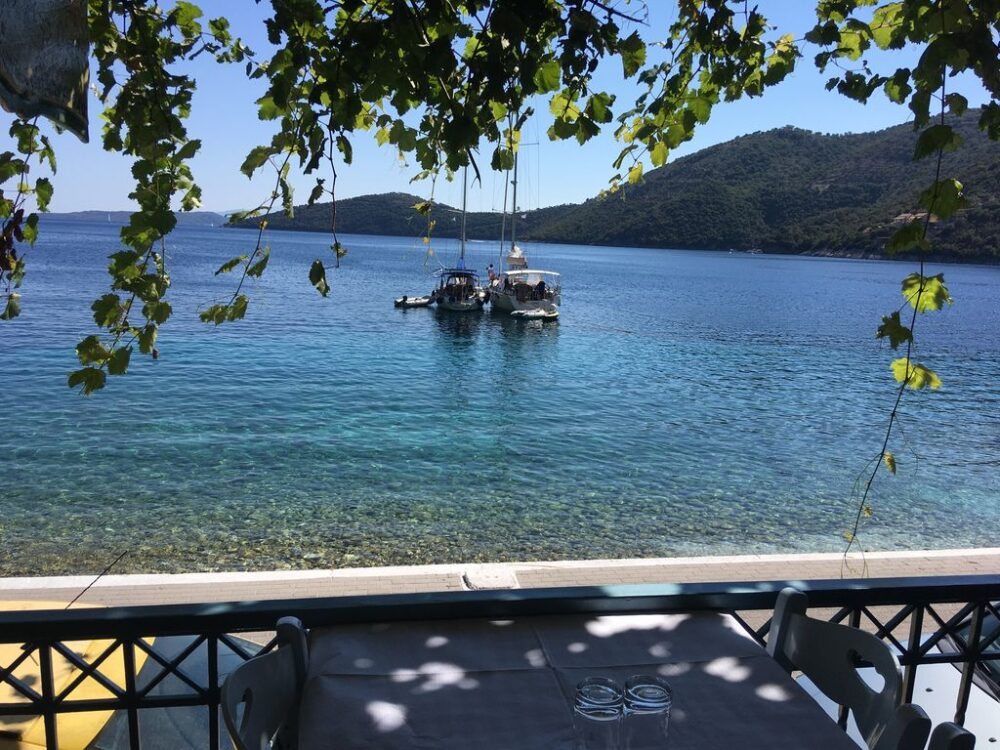 practical tips in Lefkada: a waterside taverna in Mikros Gialos overlooking the bay.
