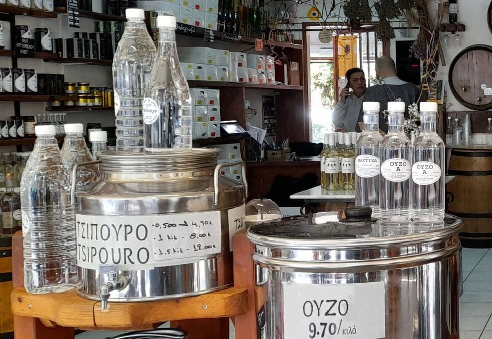 stainless steel barrel filled with bulk Tsipouro and ouzo at the Kalamata market in Greece