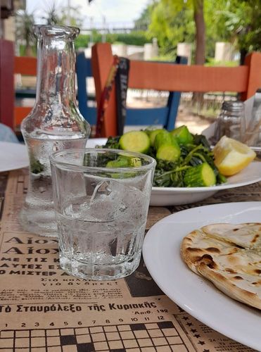 tsipouro served with mezzes in Crete