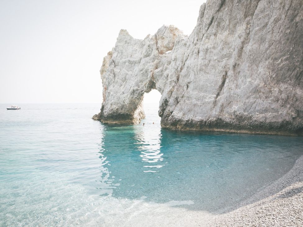 Lalaria beach in Skiathos, white cliffs and blue water